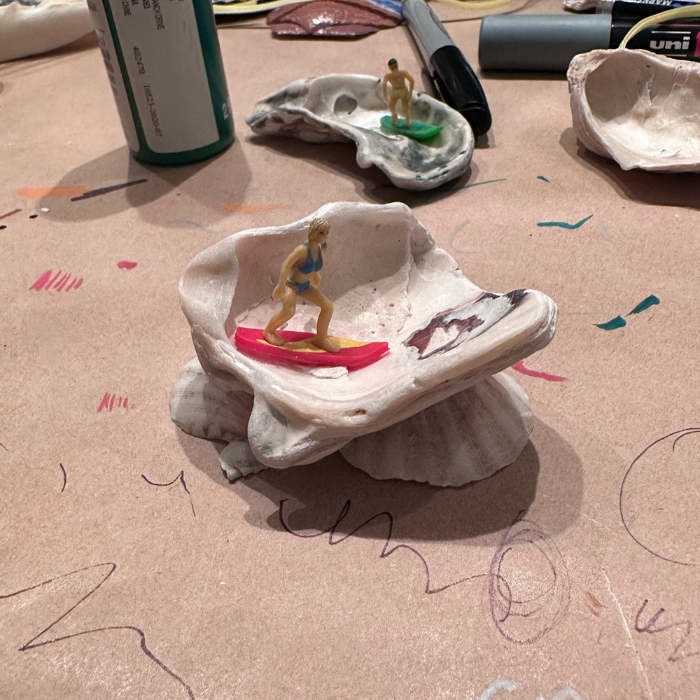 Surfer Figurine on Shell Art Piece